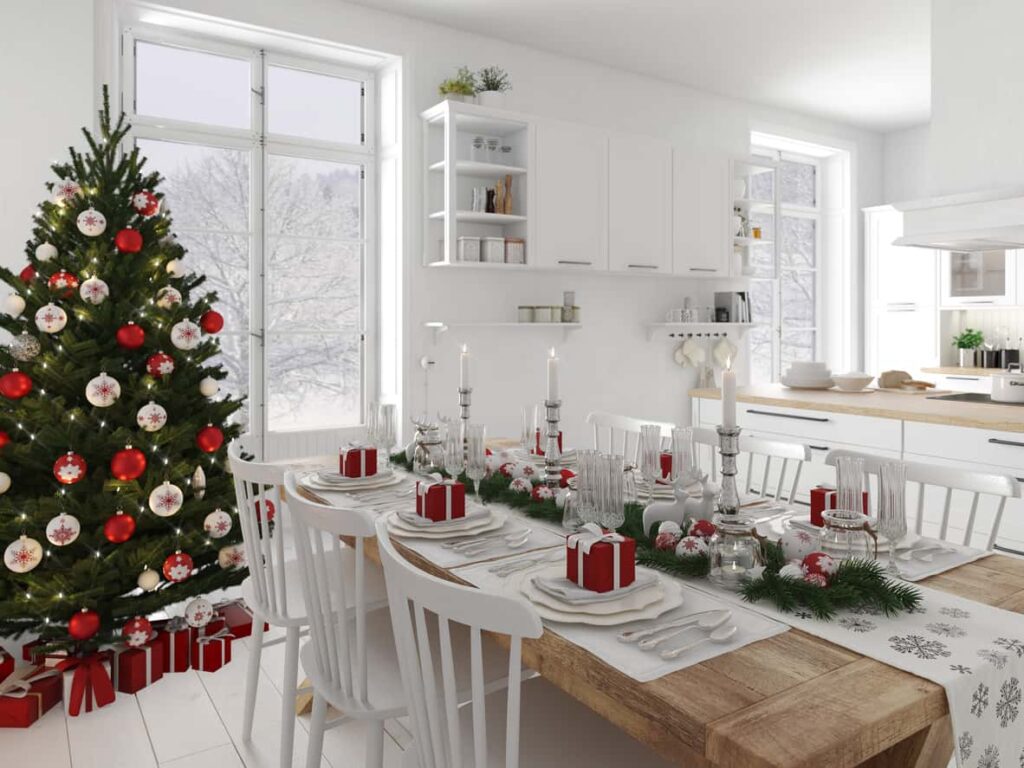 White painted kitchen and dining area decorated in Nordic Christmas style