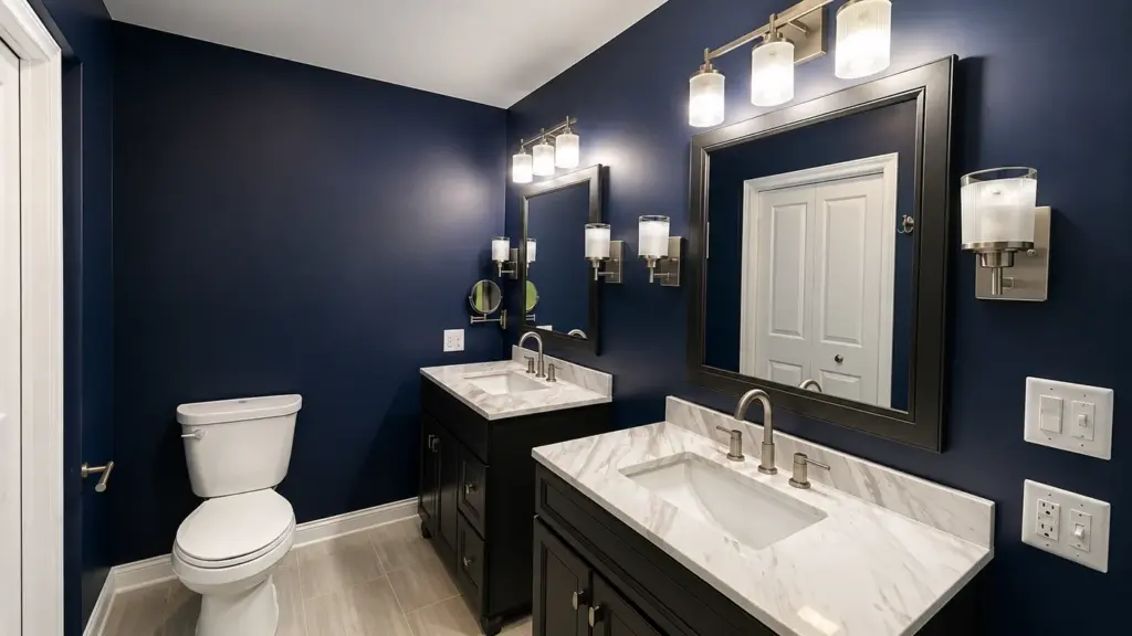 Bathroom painted in a deep navy with white trim in a Minooka home